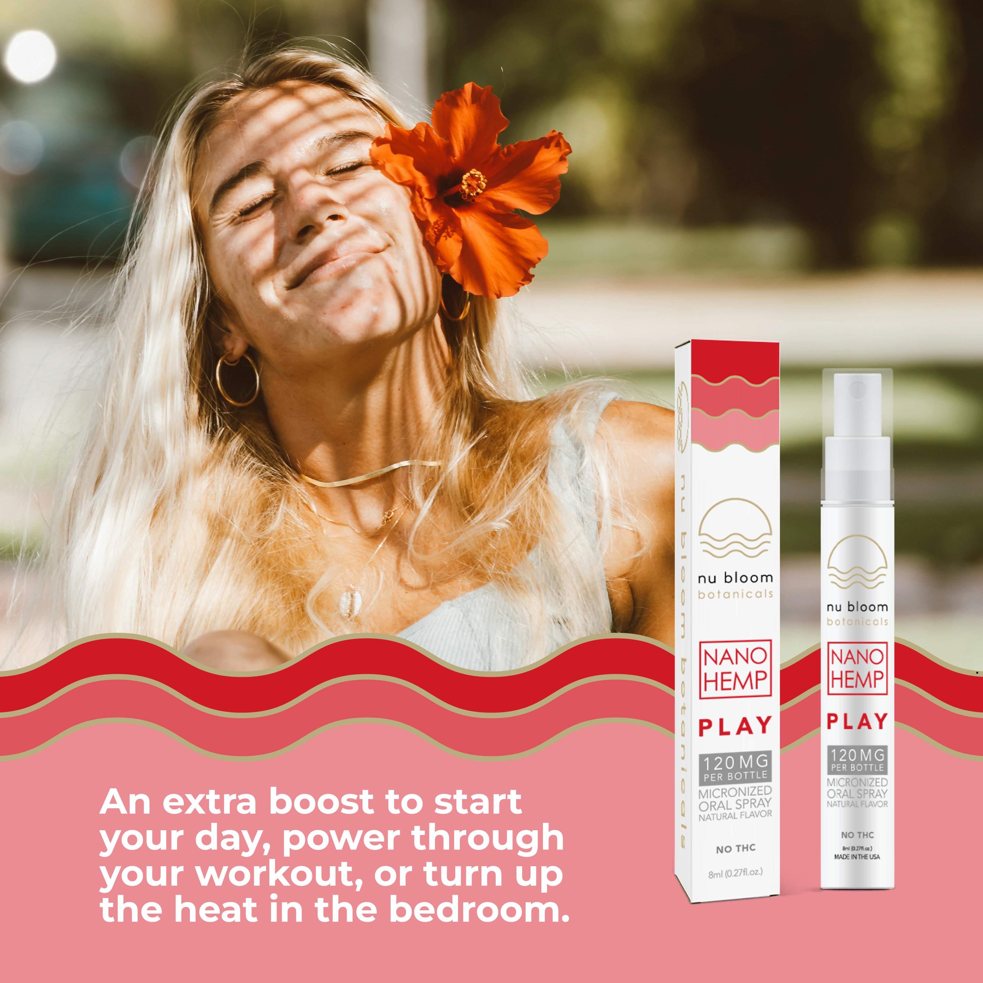 Woman with orange flower in hair outdoors, with nu bloom nano hemp products displayed.